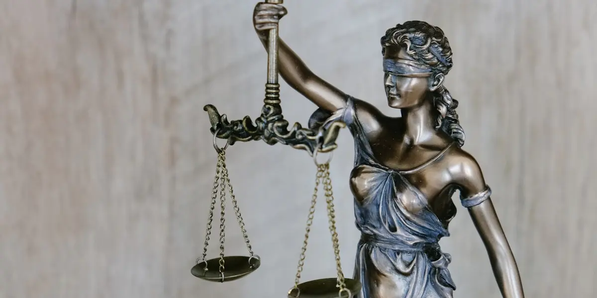 Closing documents and pen at a New Jersey real estate settlement where delinquent property taxes are paid from the sale proceeds